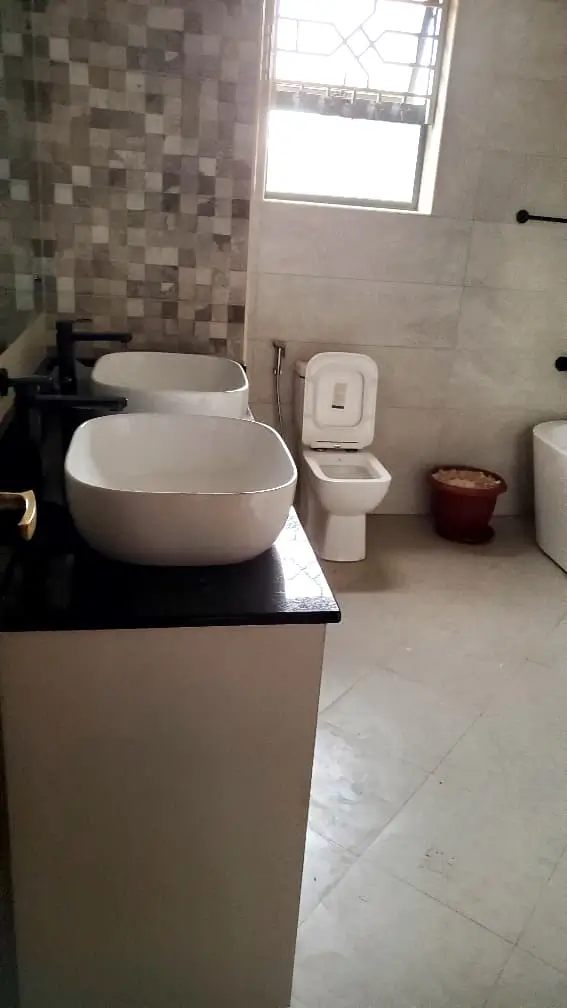 Modern bathroom plumbing installation in Kampala